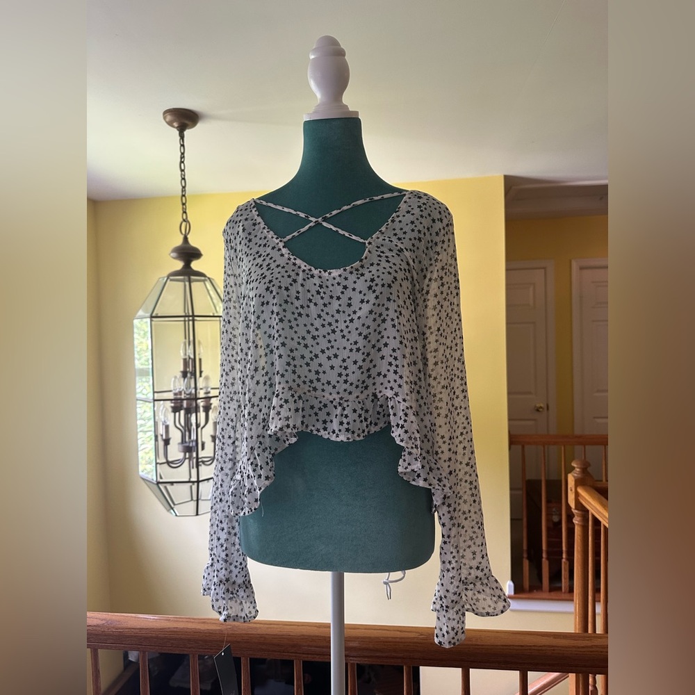 Sheer flowy star top NWT